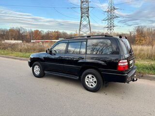 2003 Toyota Land Cruiser Cygnus 100 Series Рестайлинг 1, чёрный, 1250000 рублей, вид 3