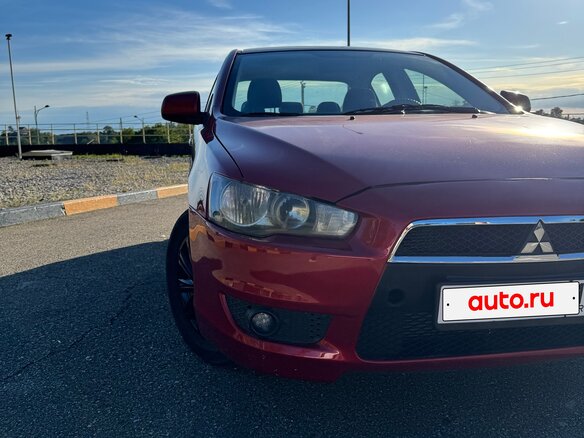 2007 Mitsubishi Lancer X, красный, 635000 рублей - вид 2