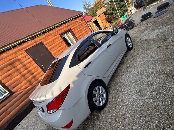 2014 Hyundai Solaris I Рестайлинг, бежевый - вид 4