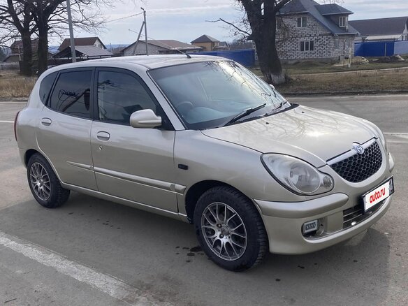 2002 Toyota Duet, серый - вид 3