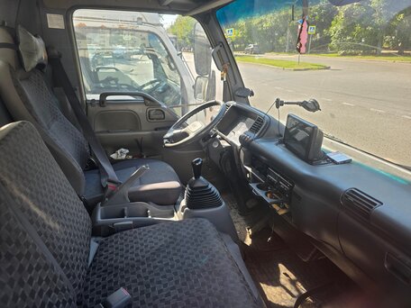 2009 Isuzu Elf (N-series), белый, 1340000 рублей, вид 4