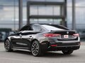 2025 BMW 4 серии 420i G22, G23, G26 Рестайлинг, чёрный - вид 4