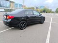 2008 Toyota Corolla X (E140, E150), чёрный, 950000 рублей - вид 6