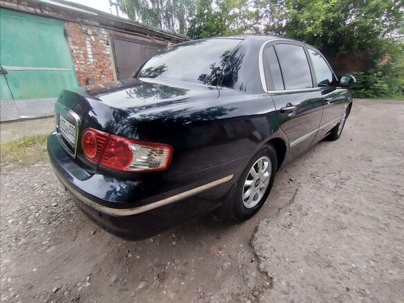 2006 Kia Opirus I, синий - вид 4