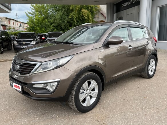 2011 Kia Sportage III, коричневый, 1235000 рублей