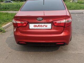 2013 Kia Rio 4-speed III, красный, 700000 рублей, вид 3