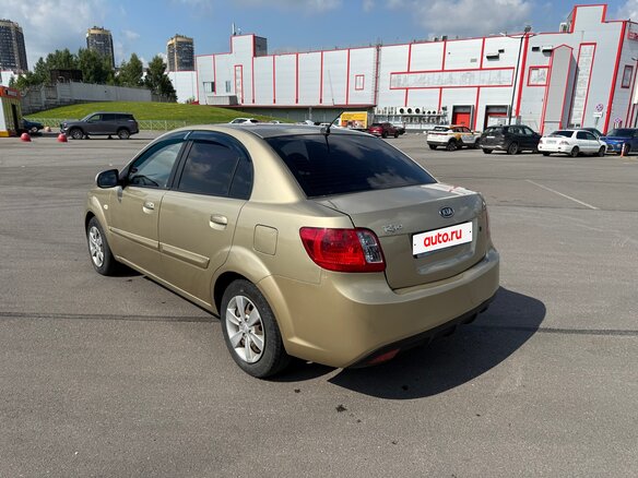 2011 Kia Rio II Рестайлинг, бежевый - вид 5
