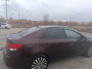 2011 Kia Cerato 6-speed II, пурпурный, 650000 рублей, вид 4