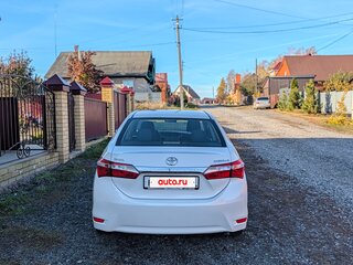 2014 Toyota Corolla XI (E160, E170, E180), белый, 1350000 рублей, вид 3