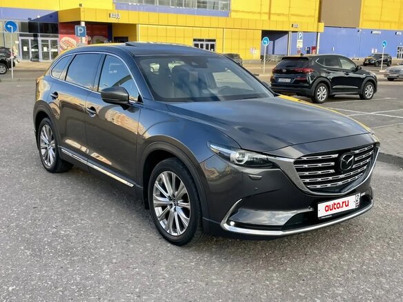 2022 Mazda CX-9 II Рестайлинг, серый, 4500000 рублей - вид 2