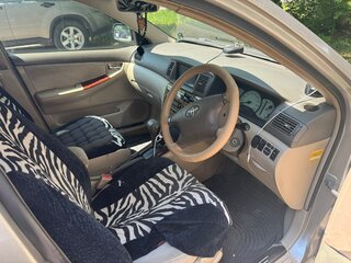 2001 Toyota Corolla IX (E120, E130), золотистый, 500000 рублей, вид 4
