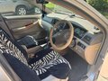 2001 Toyota Corolla IX (E120, E130), золотистый, 500000 рублей - вид 3