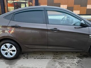 2014 Hyundai Solaris I Рестайлинг, коричневый, 950000 рублей, вид 4