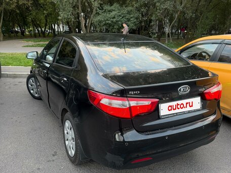 2012 Kia Rio III, чёрный, вид 3