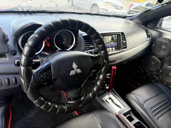 2010 Mitsubishi Lancer X, красный, 1399999 рублей - вид 7