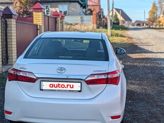 2014 Toyota Corolla XI (E160, E170, E180), белый, 1350000 рублей, вид 4