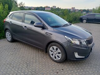 2014 Kia Rio 6-speed III, серый, 850000 рублей, вид 3