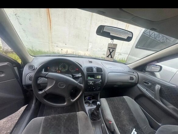 1998 Mazda 323 VI (BJ), чёрный, 65000 рублей - вид 1