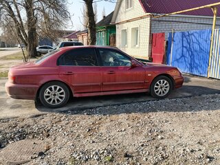2005 Hyundai Sonata ТагАЗ IV (EF) Рестайлинг, красный, 300000 рублей, вид 2