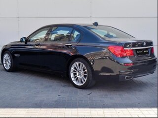 2010 BMW 7 серии Long 750Li xDrive V (F01/F02/F04), чёрный, 1400000 рублей, вид 4
