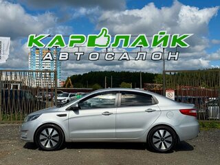 2013 Kia Rio 4-speed III, серебристый, 979000 рублей, вид 3