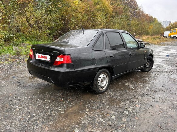 2011 Daewoo Nexia I Рестайлинг, чёрный, 150000 рублей