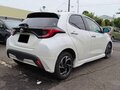 2023 Toyota Yaris IV, белый - вид 3