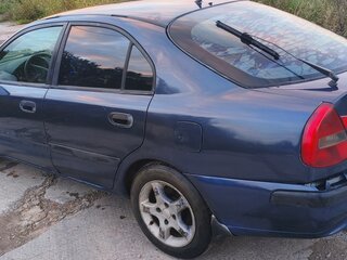 2003 Mitsubishi Carisma I Рестайлинг, синий, 110000 рублей, вид 4