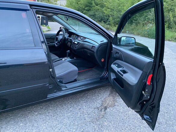 2005 Mitsubishi Lancer IX, чёрный - вид 31