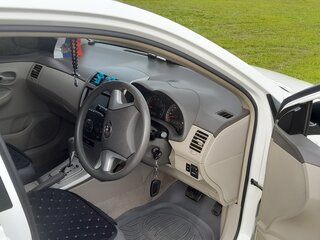 2011 Toyota Corolla Axio X (E140, E150) Рестайлинг, белый, 900000 рублей, вид 4
