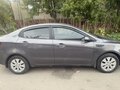 2013 Kia Rio 5-speed III, серый, 620000 рублей - вид 1