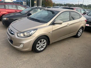 2011 Hyundai Solaris I, бежевый, 589000 рублей, вид 2