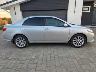 2010 Toyota Corolla X (E140, E150), серебристый, 1150000 рублей, вид 2