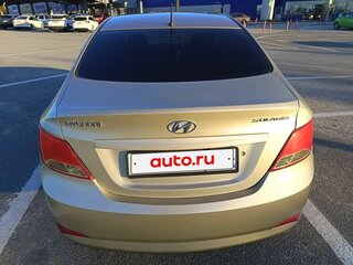 2011 Hyundai Solaris I, золотистый, 650000 рублей, вид 3