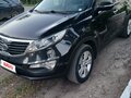 2012 Kia Sportage III, чёрный, 1095000 рублей
