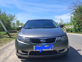 2012 Kia Cerato 6-speed II, серебристый, 1100000 рублей, вид 2