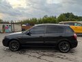 2004 Nissan Almera II (N16) Рестайлинг, чёрный - вид 4