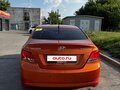 2014 Hyundai Solaris I Рестайлинг, оранжевый, 950000 рублей - вид 4