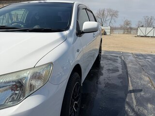 2010 Toyota Corolla Axio X (E140, E150) Рестайлинг, белый, 680000 рублей, вид 4