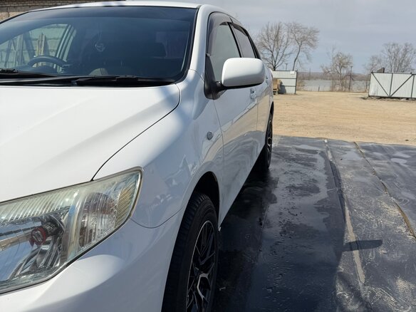 2010 Toyota Corolla Axio X (E140, E150) Рестайлинг, белый, 680000 рублей - вид 3