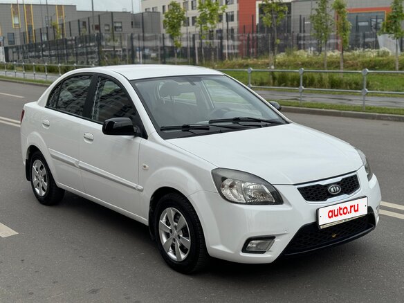 2011 Kia Rio II Рестайлинг, белый - вид 5