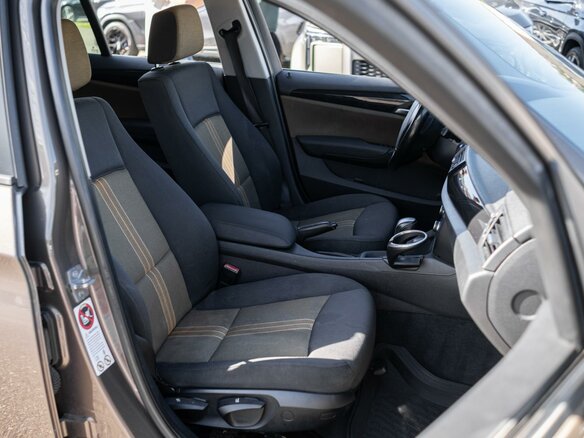 2011 BMW X1 18i I (E84), коричневый - вид 7