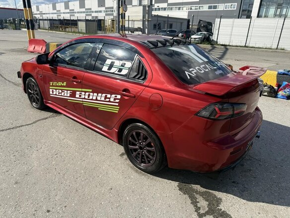 2010 Mitsubishi Lancer X, красный, 1399999 рублей - вид 17