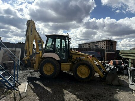 2013 Komatsu WB97S-5, жёлтый, 7500000 рублей, вид 2