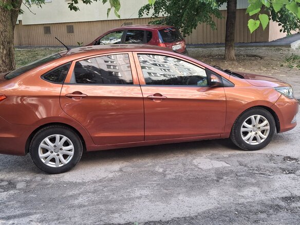 2014 Haima M3, оранжевый, 387000 рублей - вид 2