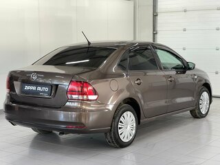 2015 Volkswagen Polo V Рестайлинг, коричневый, 909000 рублей, вид 4