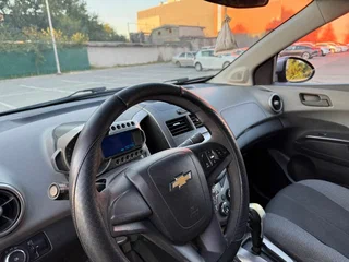 2013 Chevrolet Aveo II, серый, 550000 рублей, вид 4