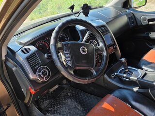 2012 SsangYong Korando Sports, коричневый, 700000 рублей, вид 5