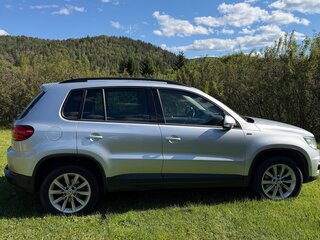 2014 Volkswagen Tiguan I Рестайлинг, серебристый, 1400000 рублей, вид 2