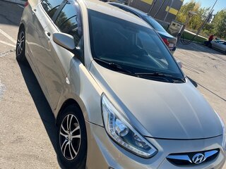 2014 Hyundai Solaris I Рестайлинг, золотистый, 520000 рублей, вид 3